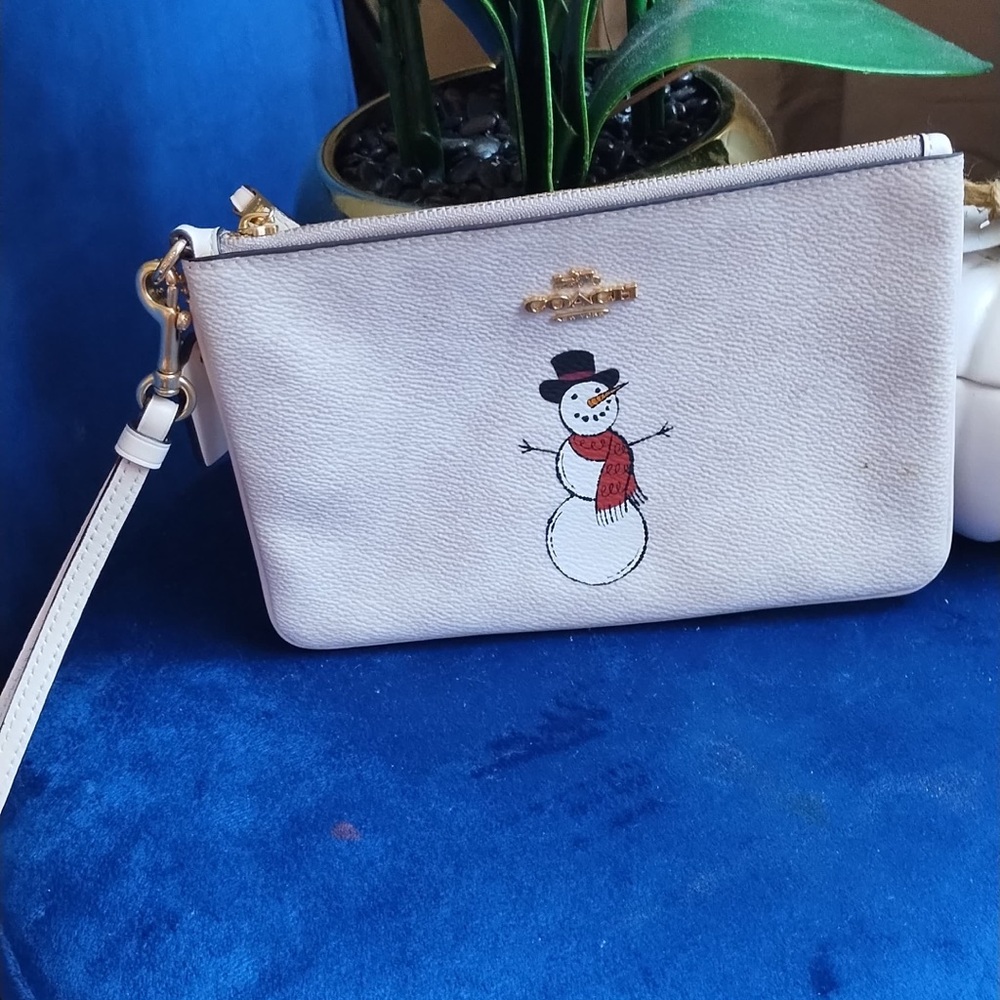 Coach Ivory Snowman Wristlet
